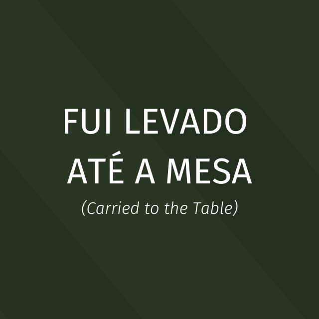 Fui levado até à mesa